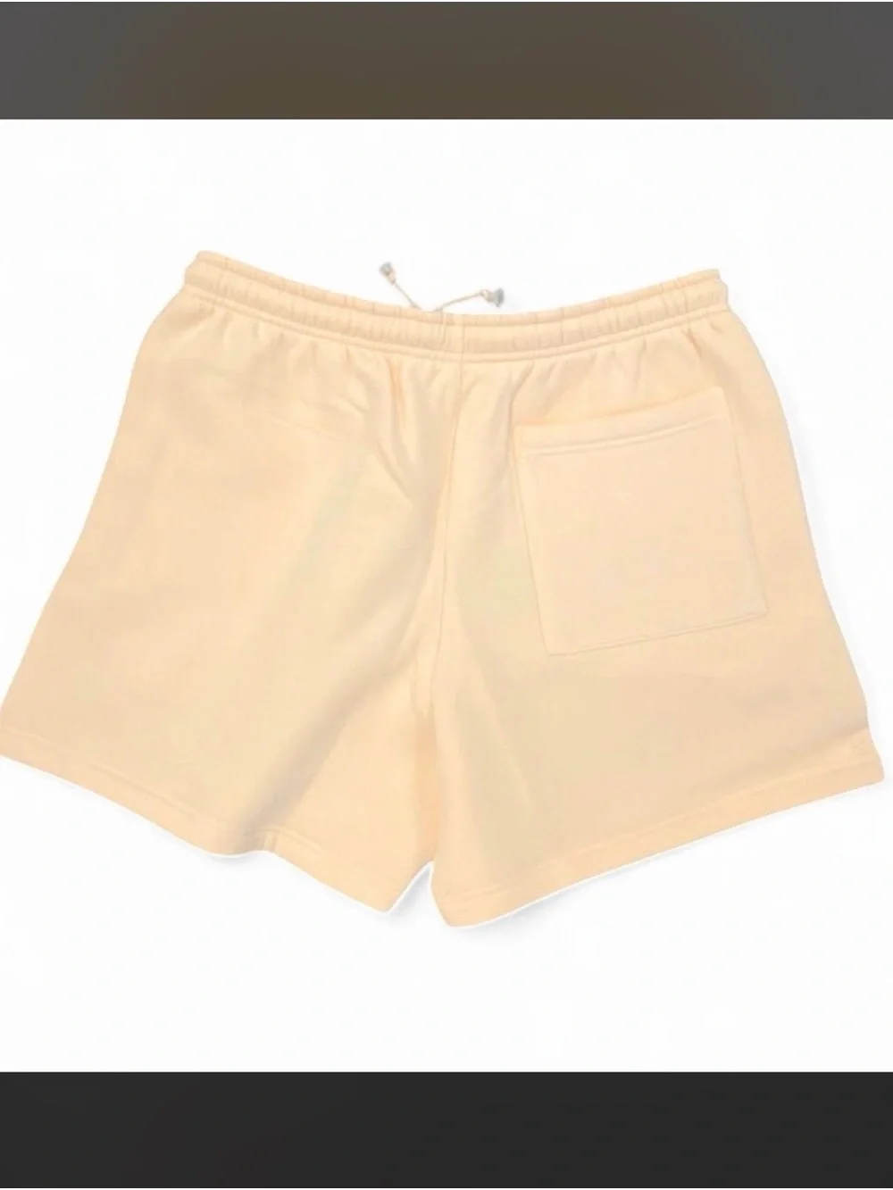 Peanuts Cream Athletic Drawstring Shorts with Blue Logo